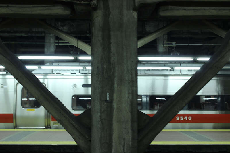 500px provided description: Straight on view of pillars on a platform at Grand Central Terminal. [#train ,#urban ,#station]