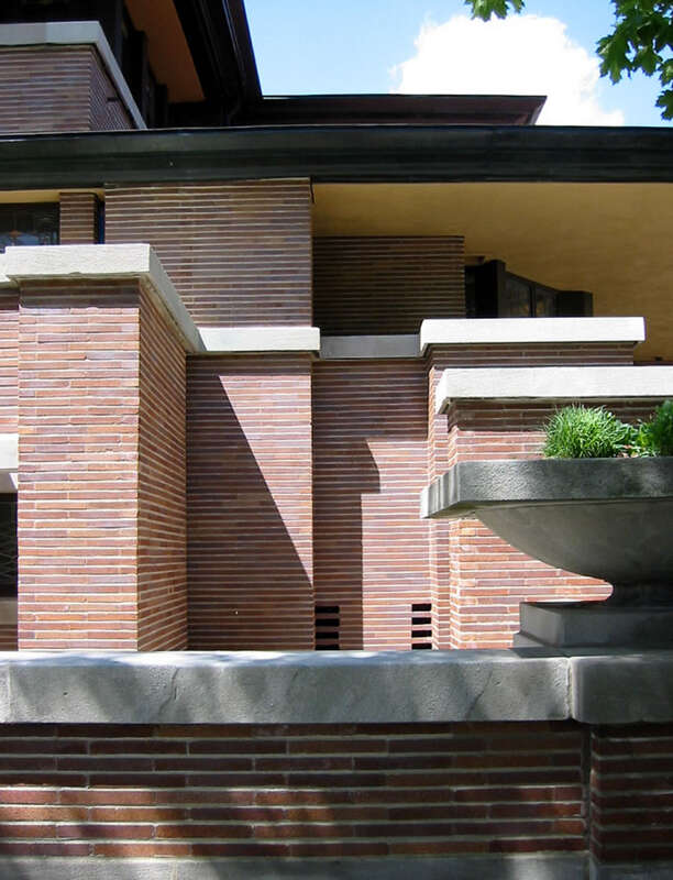 Intricately stepped massing. Note the long Roman bricks, with the vertical mortar lines painted so that they visually recede.