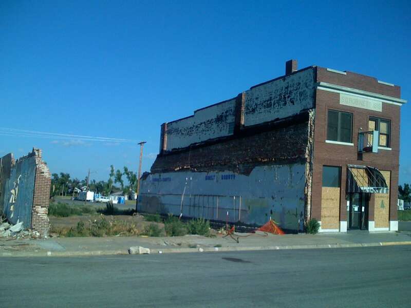 Front and northern side of the S.D. Robinett Building, located at 148 S. Main Street in Greensburg, Kansas, United States.  Built in 1915 as a commercial building and later converted to a bank, it is currently vacant.  As the only building in