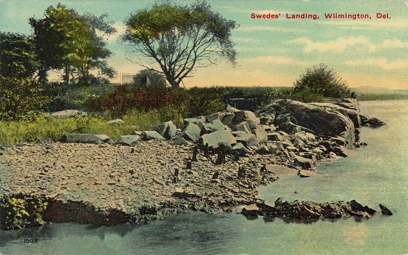Front of a postcard with an early 20th century photograph of Swedes' Landing (also known as &quot;The Rocks&quot;) along the Christina River in Wilmington, Delaware. This is the area where the ships Kalmar Nyckel and Fogel Grip arrived in March 1638 carrying