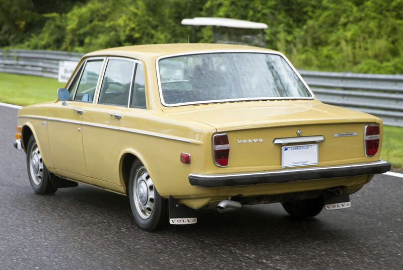 1971 Volvo 144S in Sunshine Yellow with Brown interior taking part in the Meeting of the Marques at the 2021 Lime Rock Historic Festival. B20S engine, M40 transmission with overdrive. Has a retrofitted sixties' style grille, which looks nice but