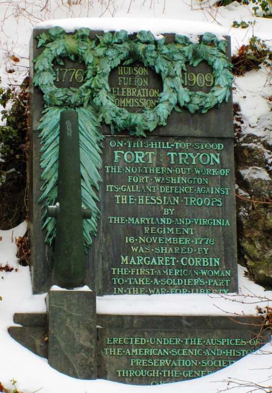 An old plaque dedicated to Margaret Corbin, the first woman to fight in the American Revolutionary War, in Fort Tryon Park in Upper Manhattan, New York City.  A newer plaque is located in a more traveled place in the park.