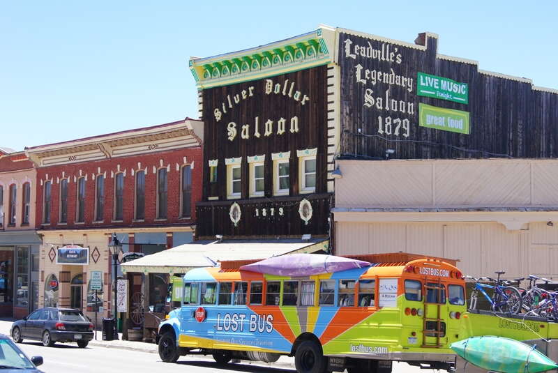 A colorful bus on Leadville street