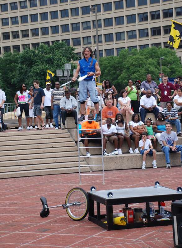 Street performer at work in Baltimore Harbor