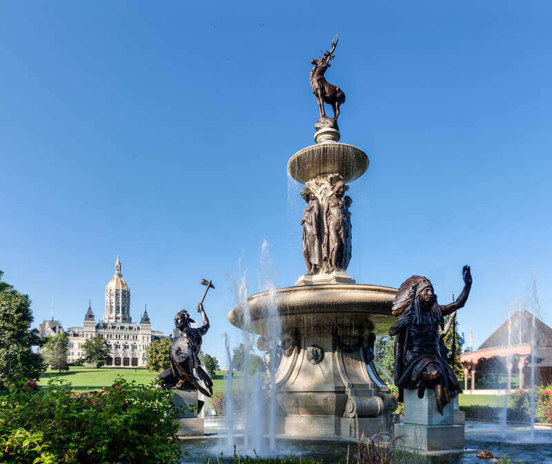 Connecticut Capitol Building and Corning Fountain, Bushnell Park, Hartford Connecticut.