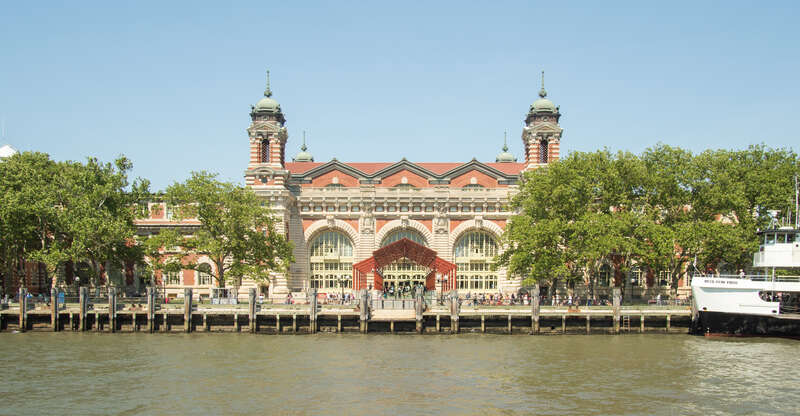 The Ellis Island Immigration Museum, viewed from the Ellis Island Immigrant Hospital.