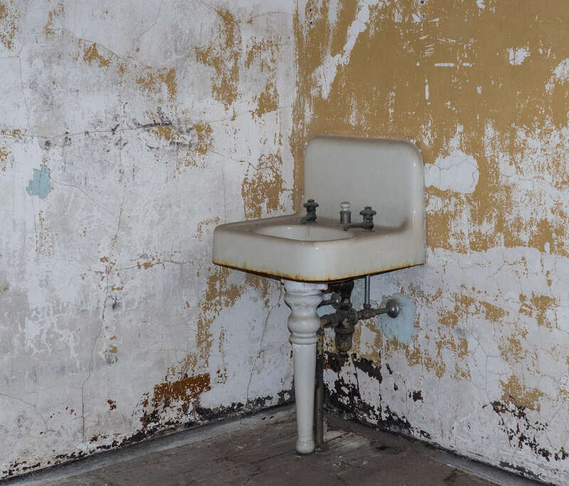 A sink in a hospital room at the Ellis Island Immigrant Hospital, closed since 1930.