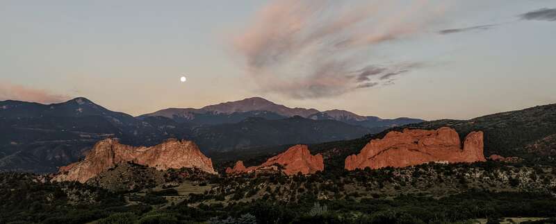 Garden of the Gods near sunrise, approaching the setting of the &quot;seasonal blue moon&quot;, August 2021
