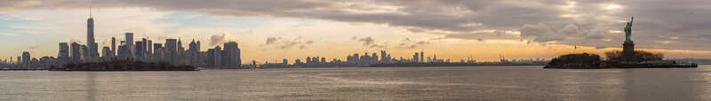 NYC skyline, Ellis Island, and Statue of Liberty right after sunrise.
I was in Los Angeles until after Christmas and then ended up in NYC on New Year's Eve during the day. A friend of mine needed to pick up a car part that was too expensive to ship,