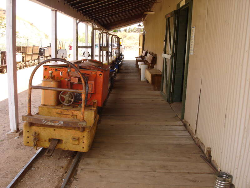 The mine train, awaiting the next group of tourists. / Mining Battery Locomotive Copper Queen Mine Arizona