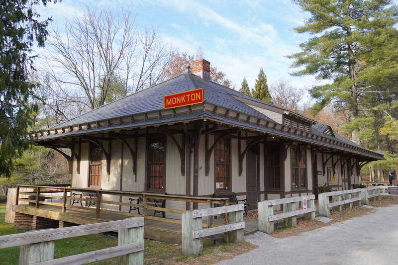 Monkton railroad station, three quarters view; red sign reading "MONKTON" is visible