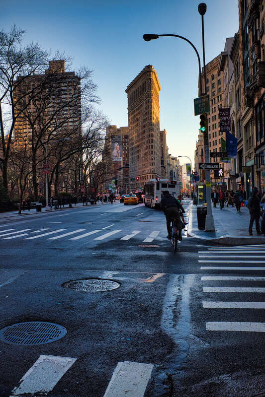 500px provided description: There was a storm and then in just 30mn, the sun came and illuminated this dynamic city but still most of the light were blocked by so many high buildings creating high shadows and contrasts. [#travel ,#Sunset ,#New York