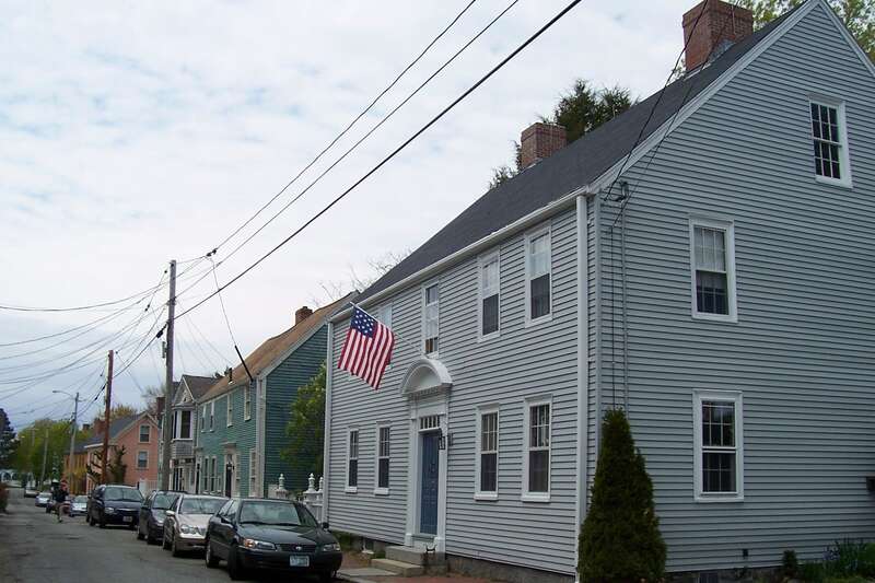 Portsmouth Streets are lined with historic old homes, most meticulously restored.  This is near Strawberry Banke, but I am not sure of the exact street. 

Notice the flag has 15 stars and 15 stripes.  The Flag Act of 1794 (1 Stat. 341) was signed