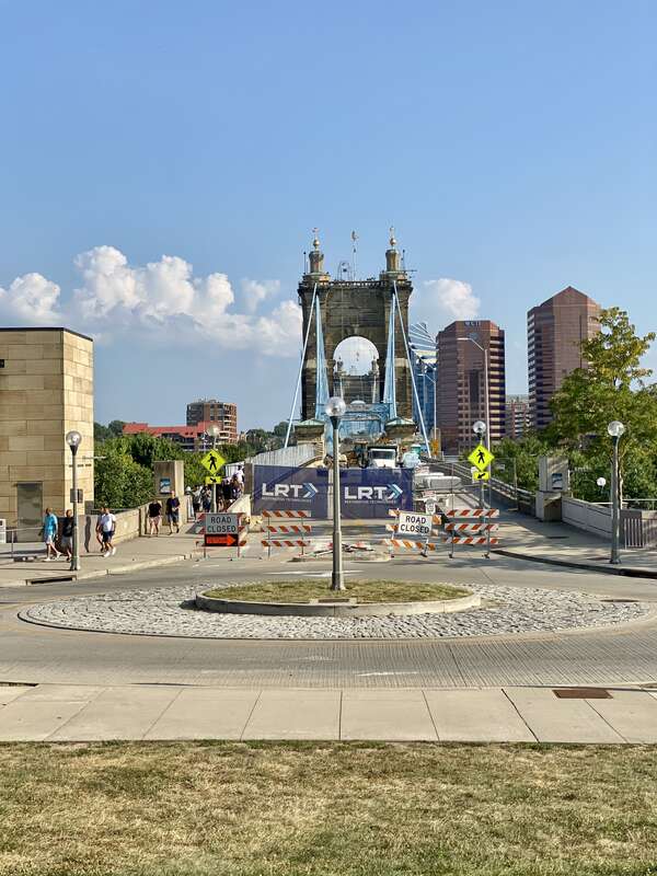 The John A. Roebling Suspension Bridge spans the Ohio River, and connects the cities of Covington, Kentucky and Cincinnati, Ohio. Begun in 1856, it was designed and built by famed engineer John A. Roebling, whom went on to design the more famous