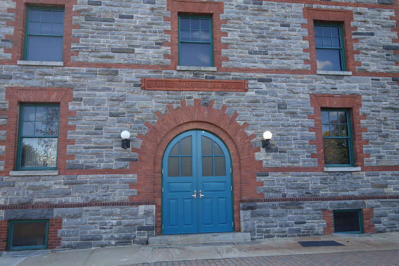 The entrance into the north end of the Strecker Memorial Laboratory at the east side of Southpoint Park, at East Road south of South Loop Road at approximately Manhattan 53rd Street in the southern half of Roosevelt Island, Manhattan. Originally