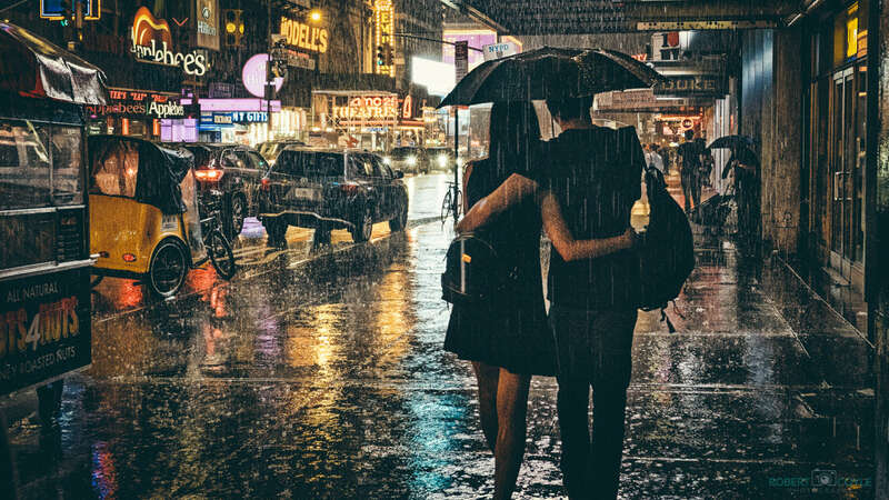 500px provided description: Together [#city ,#rain ,#new york ,#love ,#hold ,#walking ,#together ,#romance ,#manhattan ,#forever ,#big apple ,#times sqaure]