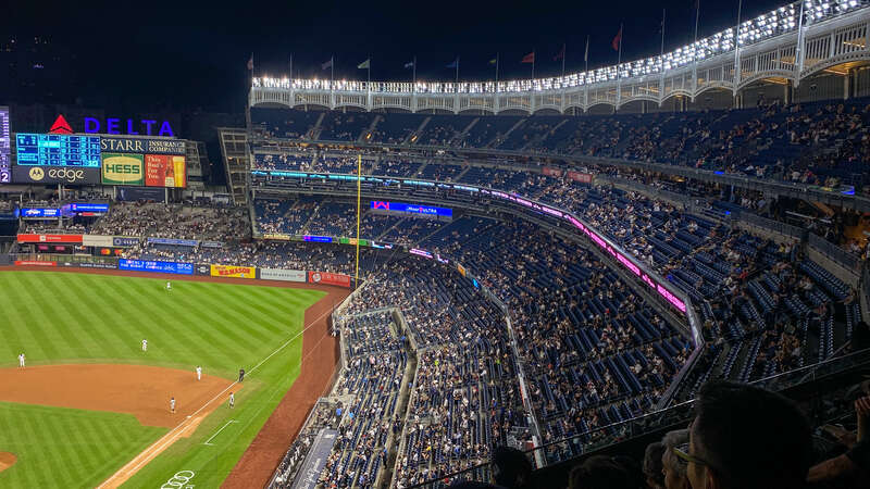 A picture of Yankee Stadium during a game between the Yankees and Pirates.