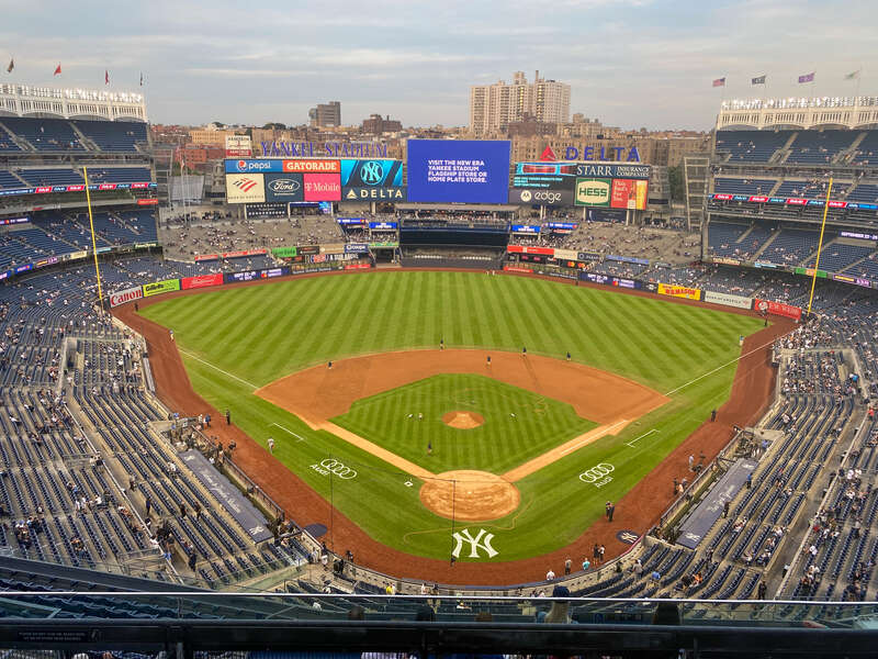 A picture of Yankee Stadium during a game between the Yankees and Pirates.