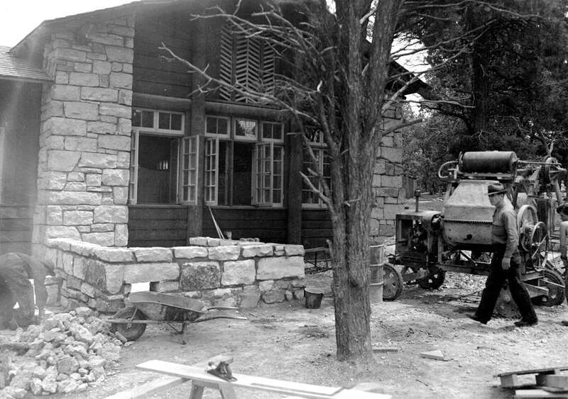 Workmen constructing retaining wall on s side of Del E. Webb constructed post office. Circa 1935. Nps.
Grand Canyon National Park Building #166  
Constructed in 1935 - Original cost was $17,890
This is a timber and stone structure with wood frame