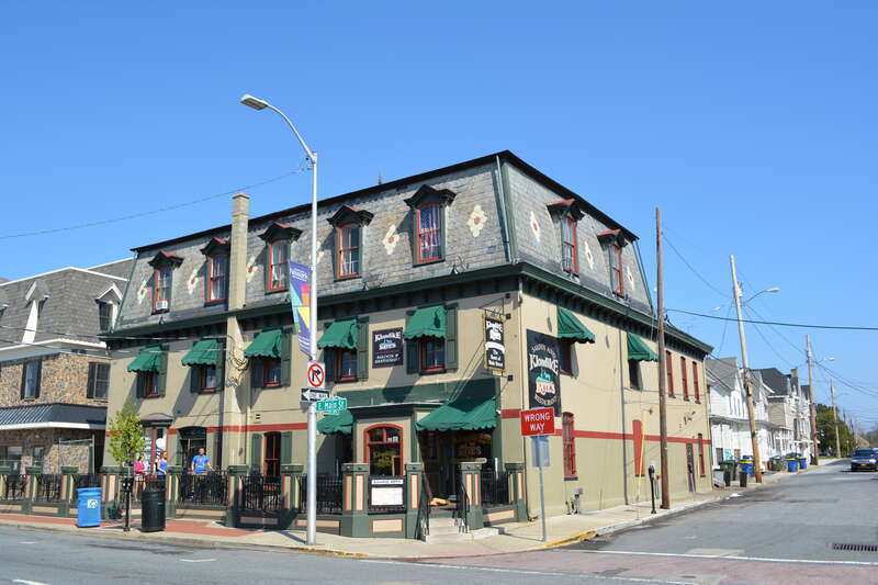 Building on Main Street, Newark, Delaware near the University of Delaware. Now a bar called Klondike Katie's. This is the Exchange Building listed on the NRHP on May 7, 1982 (#82002343) at 154-158 E. Main St.