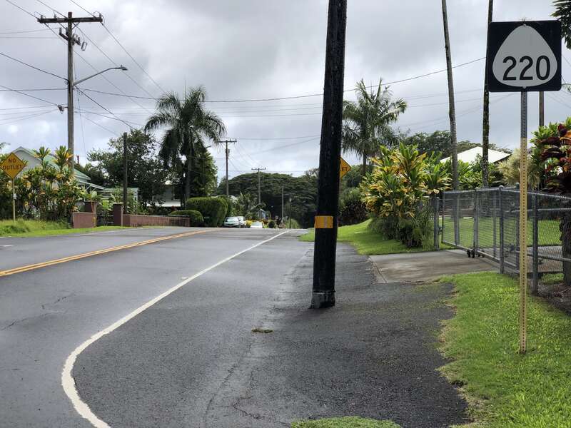 View southeast along Hawaii State Route 220 (Old Māmalahoa Highway) at ʻAkaka Falls Road in Honomū, Hawaii County, Hawaii