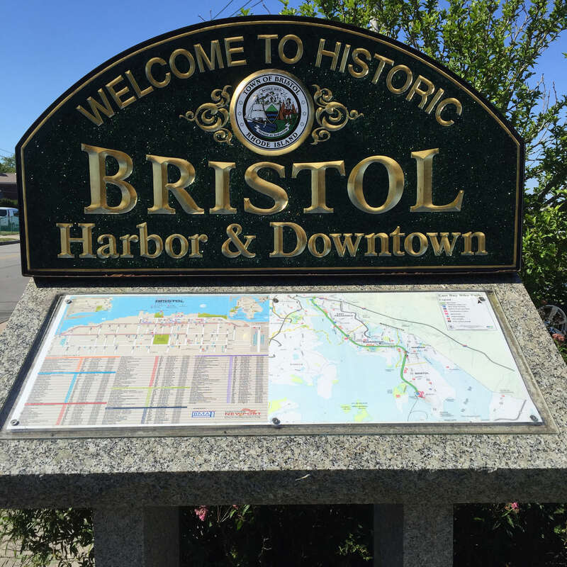 Sign says: Welcome to Historic Bristol Harbor &amp;amp; Downtown.