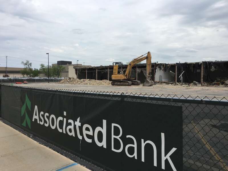 Demolition of a warehouse and office building adjacent to Camera Corner in downtown Green Bay, WI. Camera Corner is set to expand to this area.