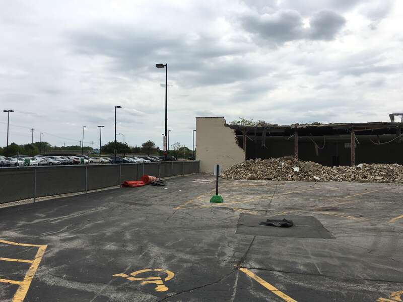 Demolition of a warehouse and office building adjacent to Camera Corner in downtown Green Bay, WI. Camera Corner is set to expand to this area.