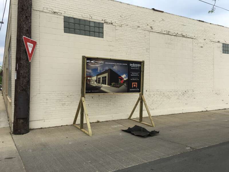 Demolition of a warehouse and office building adjacent to Camera Corner in downtown Green Bay, WI. Camera Corner is set to expand to this area.