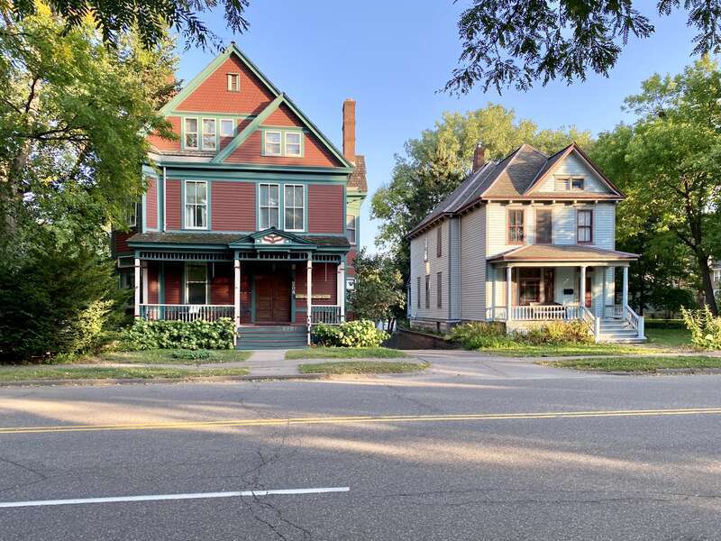 The Knox-Austin House, on the left, was built in 1885 and was designed in the Queen Anne style by James Knox Taylor.  The house was once home to Horace Austin, former governor of Minnesota (1870-1874).  The house on the right was built circa 1905 in
