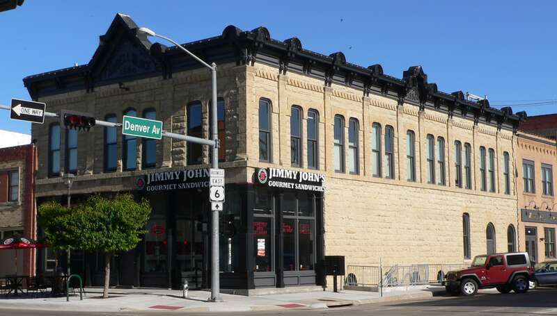 Farrell Block at southeast corner of Second Street and Denver Avenue in Hastings, Nebraska; seen from the northwest.  The building was constructed in 1880, and is listed in the National Register of Historic Places.