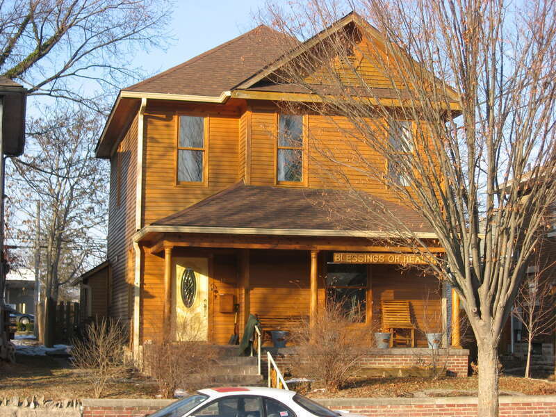 Front and western side of the house located at 412 W. Fourth Street in Bloomington, Indiana, United States.  Built in 1905, it is a part of the Bloomington West Side Historic District, a historic district that is listed on the National Register of