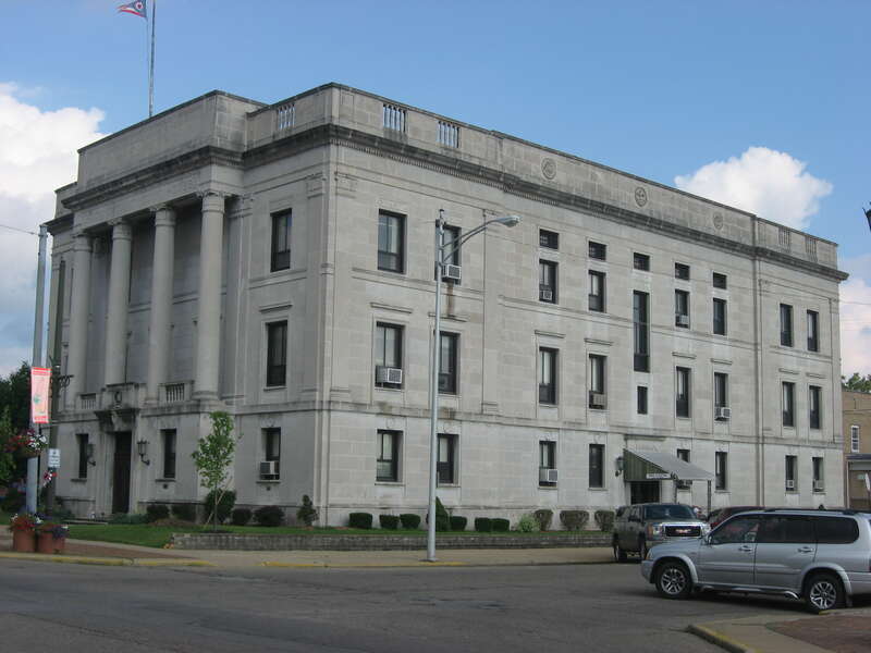 Front and western side of the Hocking County Courthouse, located at 5 E. Main Street in Logan, Ohio, United States.  Built in 1925 according to a design by Frank Packard, it is part of the Logan Historic District, a historic district that is listed