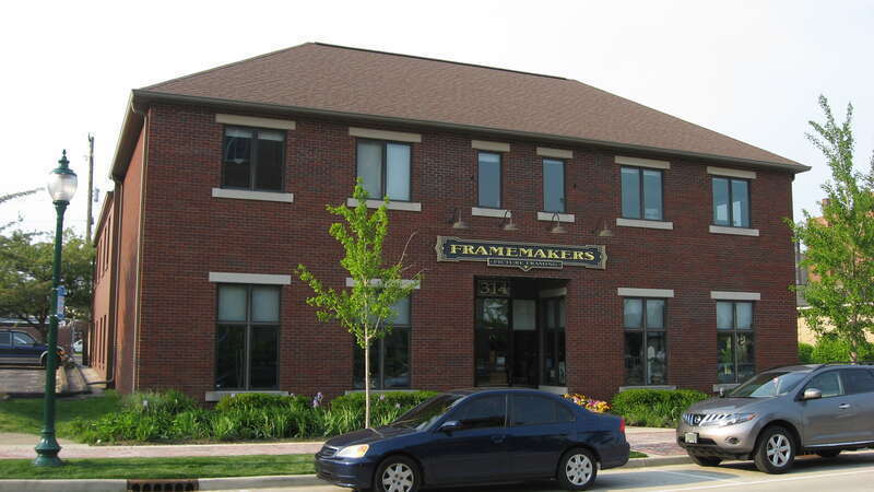 Front and western side of the office of Framemakers, a picture-frame company located at 314 W. Kirkwood Avenue in Bloomington, Indiana, United States.  Built in 1940, it is a part of the Bloomington West Side Historic District, a historic district