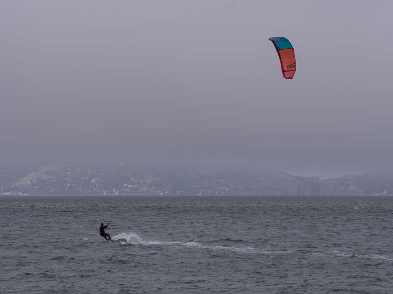 A kite surfer in San Francisco Bay near Crissy Field.