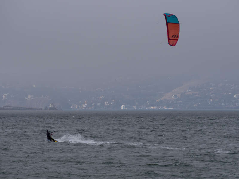 A kite surfer in San Francisco Bay near Crissy Field.