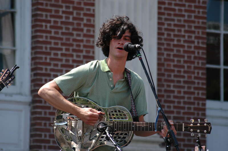 Man plays resophonic guitar at the Burlington Discover Jazz Festival in Burlington, Vermont.