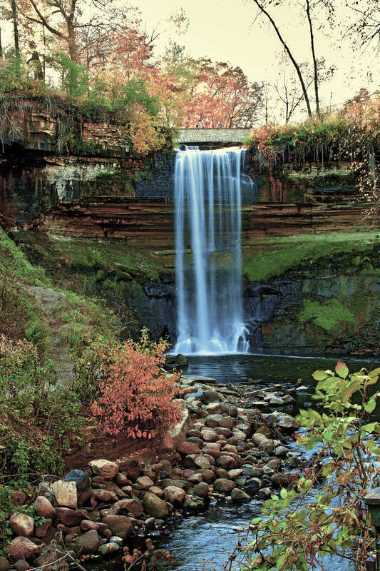 Minnehaha Falls is a 53-foot (16 meter) waterfall located in Minneapolis in Minnehaha Park on Minnehaha Creek, a tributary of the Mississippi River located in Hennepin County, Minnesota. The Falls are located near the creek's confluence with the