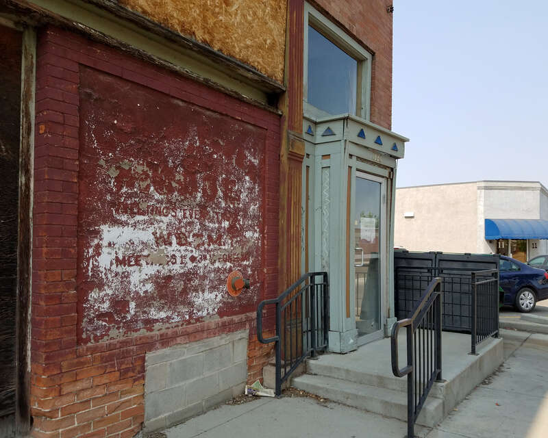 A ghost sign describing meeting times at the former Moose Lodge in Nampa, Idaho.