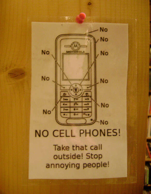 NO CELL PHONES! Take that call outside! Stop annoying people!

Myopic Books, Chicago, May 2009.