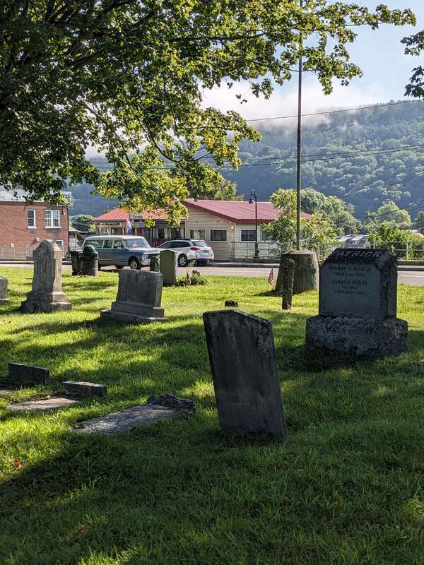 Old South Church Cemetery at 146 Main Street in downtown Windsor, Vermont -- with The Windsor Diner in background.