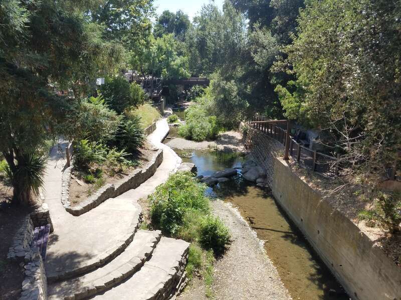 San Luis Obispo Creek, looking downstream at the Mission Plaza in downtown San Luis Obispo, California, USA.