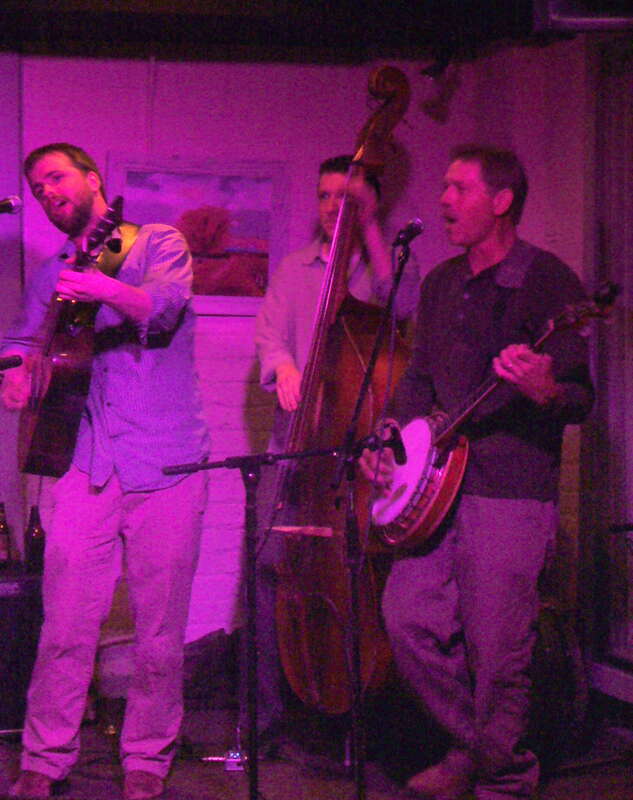 Brennan Gilmore (guitar), Zach Blatter (stand-up bass), Will Lee (banjo) of Walker's Run perform at Bel Rio in Charlottesville, Virginia on April 17, 2009.