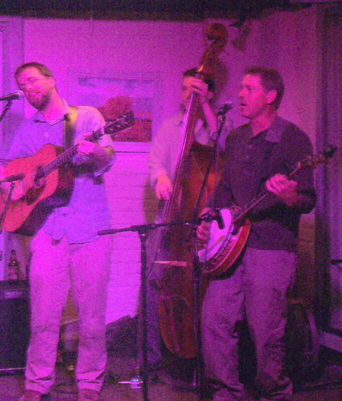 Brennan Gilmore (guitar), Zach Blatter (stand-up bass), Will Lee (banjo) of Walker's Run perform at Bel Rio in Charlottesville, Virginia on April 17, 2009.