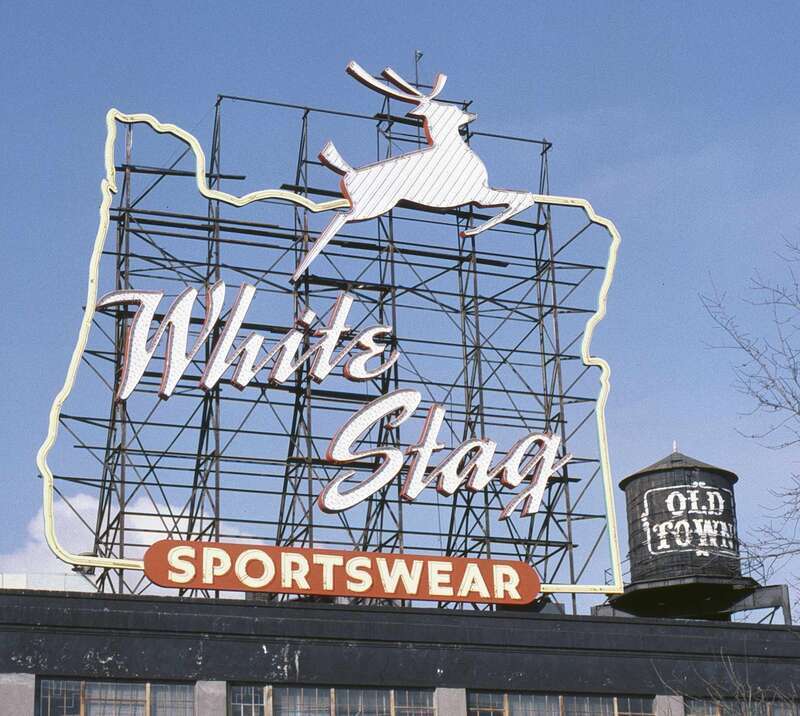 The White Stag Sign, in Portland, Oregon. The sign displayed this wording from 1957 until 1997. The basic structure has been in place since 1941, and the leaping stag – added in 1957 – remains on the sign today (2014).  The yellow outline symbolizes
