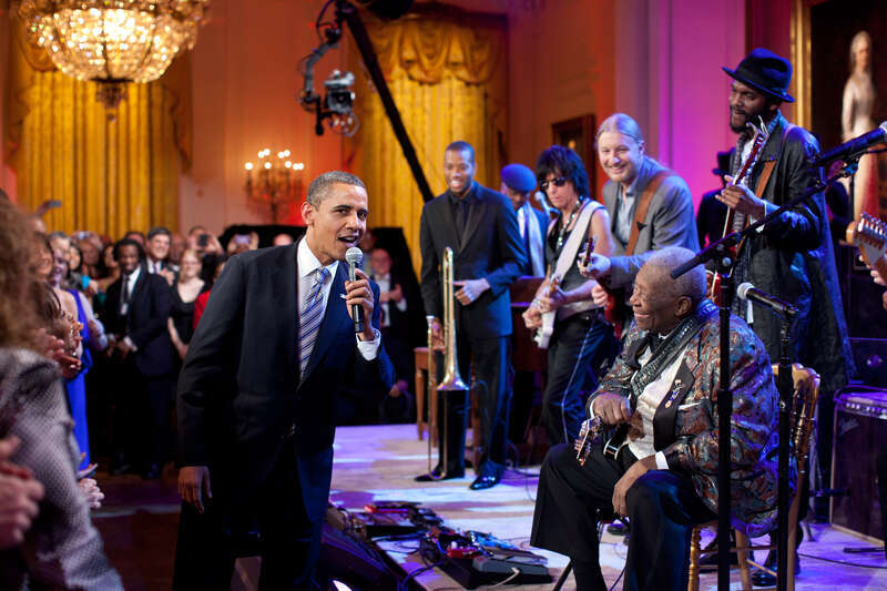 United States President Barack Obama joins in singing &quot;Sweet Home Chicago&quot; during the In Performance at the White House: Red, White and Blues concert for the Black History Month celebration of blues music in the East Room of the White House on 21