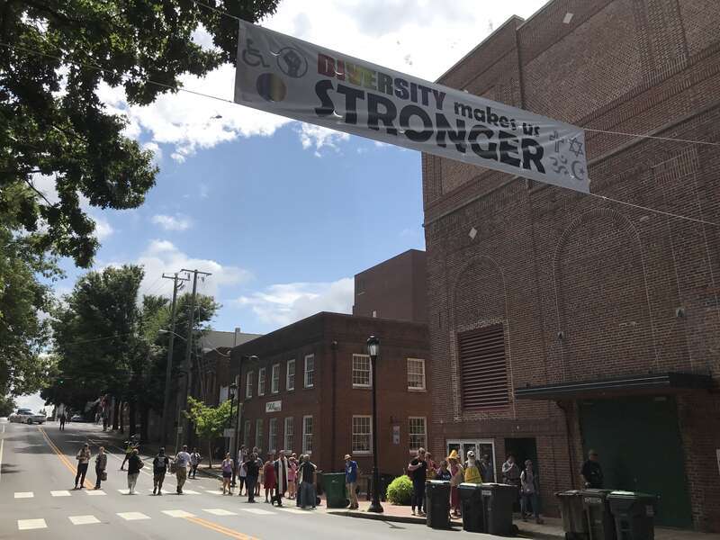 &quot;DIVERSITY makes us STRONGER&quot; banner hanging over the street near Emancipation Park.