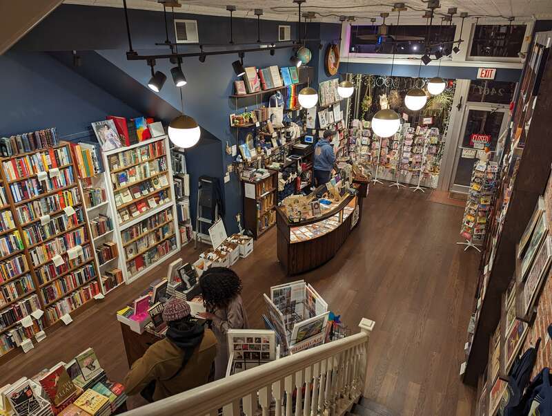 View of the first floor of Lost City Books, a bookstore in Adams Morgan, Washington, D.C., from the staircase.