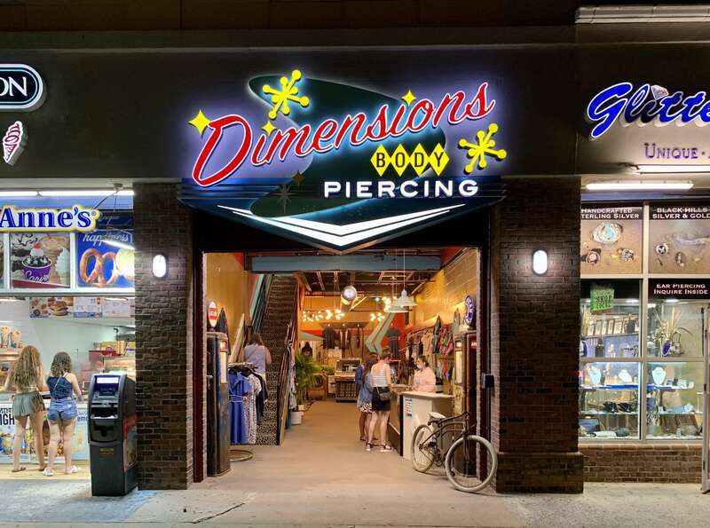 Dimensions Body Piercing on the boardwalk in Ocean City, Maryland.
