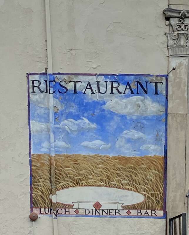 This mural is along 3rd Street in Philadelphia just off of Chestnut Street. It is on the side of building that houses a restaurant and other businesses.